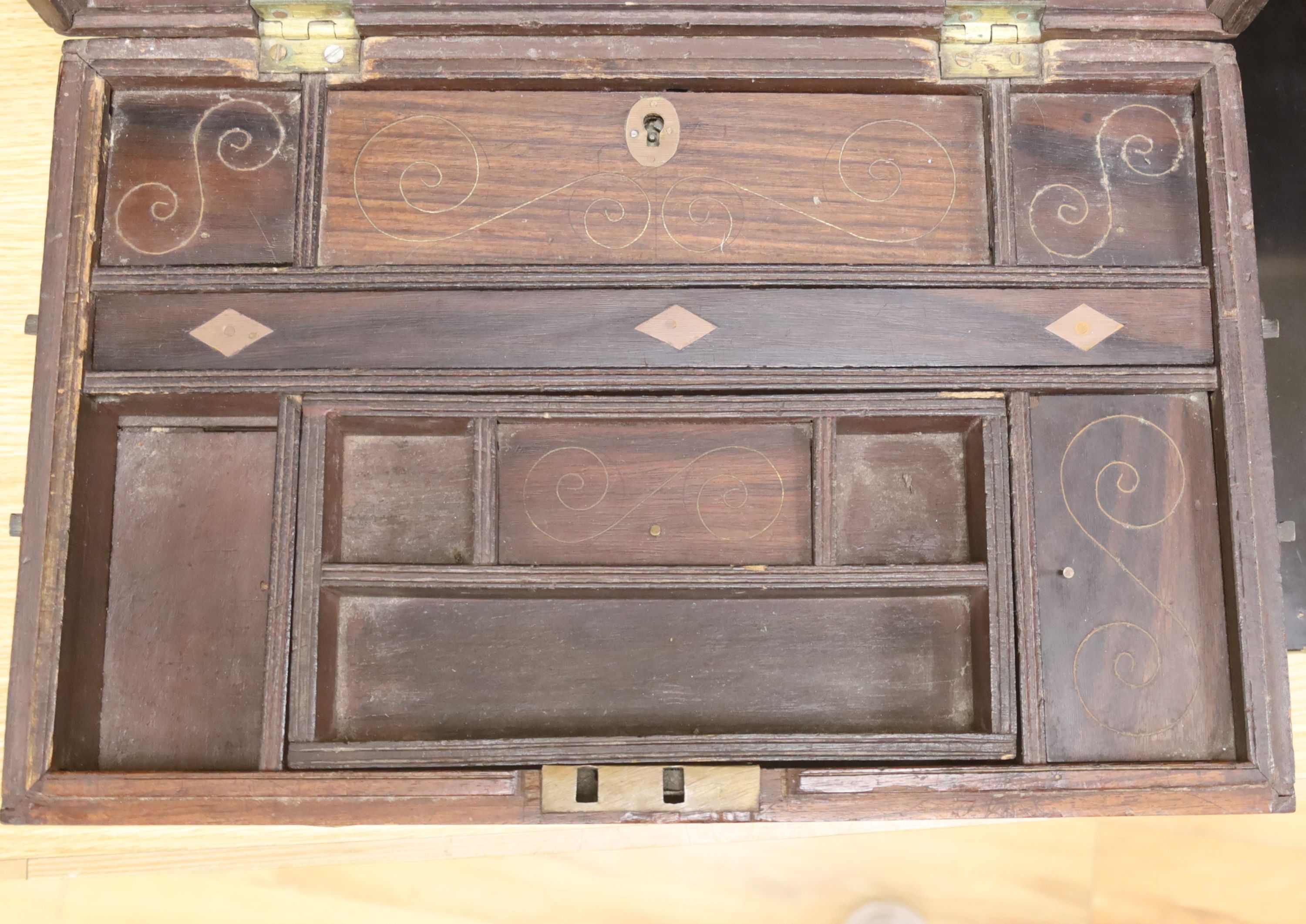 A 19th century Indo-colonial brass inlaid hardwood travelling chest, length 42cm